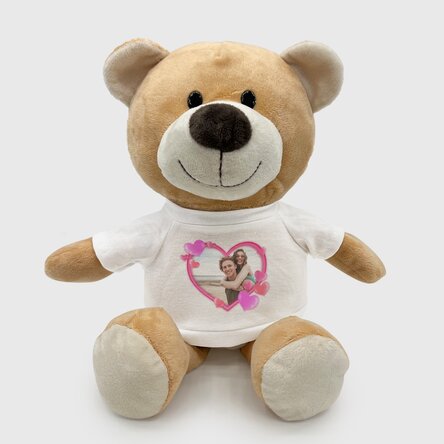 Außerdem ein personalisiertes Teddybärchen mit einem Foto und Herzchen