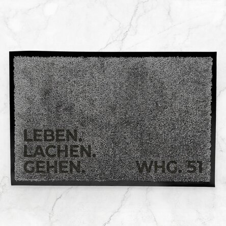 Individuell gestaltete Eingangsmatte für den Innenbereich mit dem Schriftzug „Live. Laugh. Leave.“