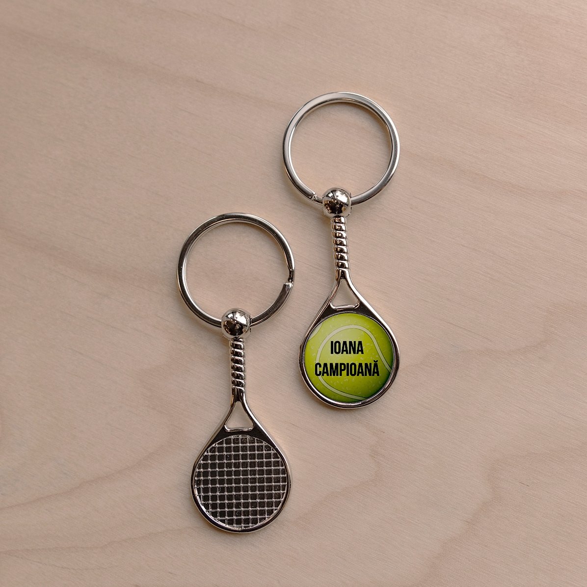 Schlüsselanhänger in Form eines Tennisballs, individuell mit Text bedruckt – Champion
