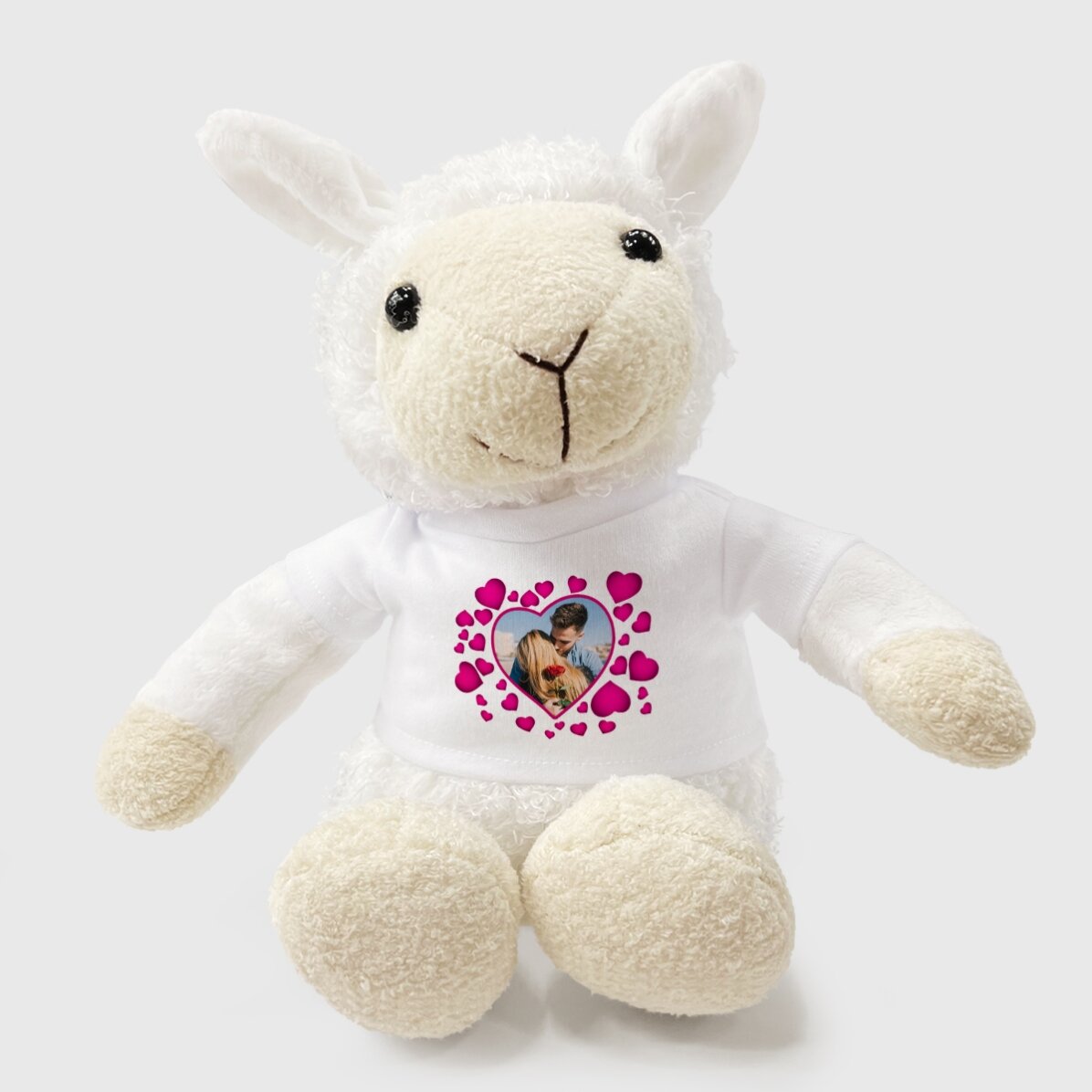Plus ein personalisiertes Schaf mit rosa Herzchen und einem Foto
