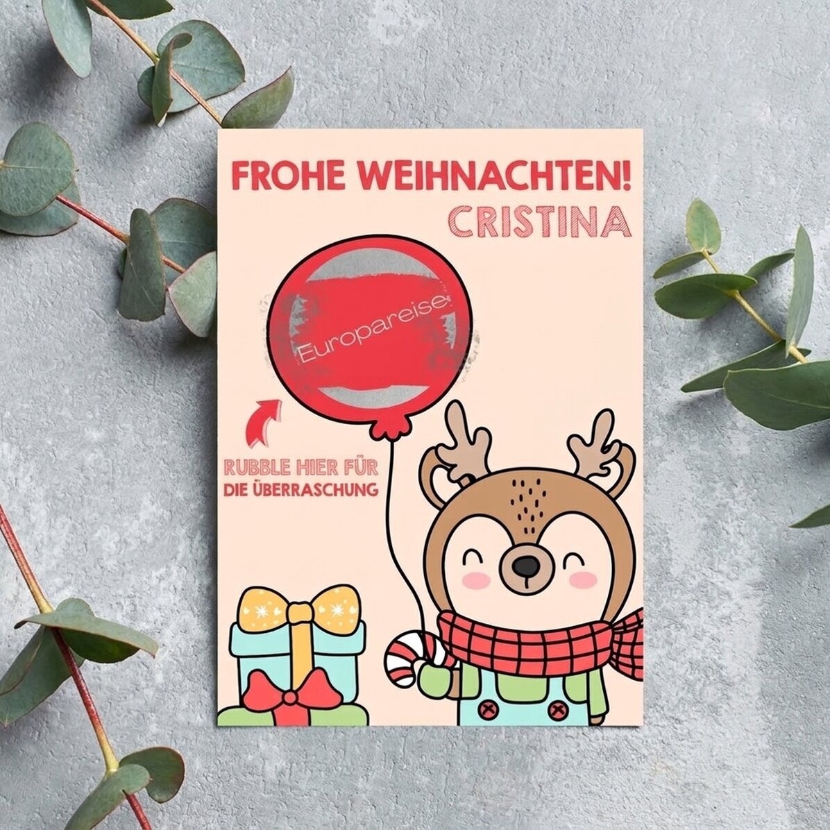 Individuell gestaltete Weihnachts-Rubbelkarte – Rentier mit Luftballon