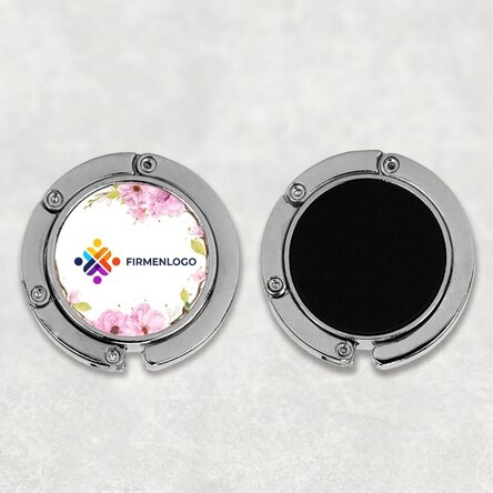 Individuell gestalteter Taschenhalter für den Tisch mit Logo und Blumenmuster