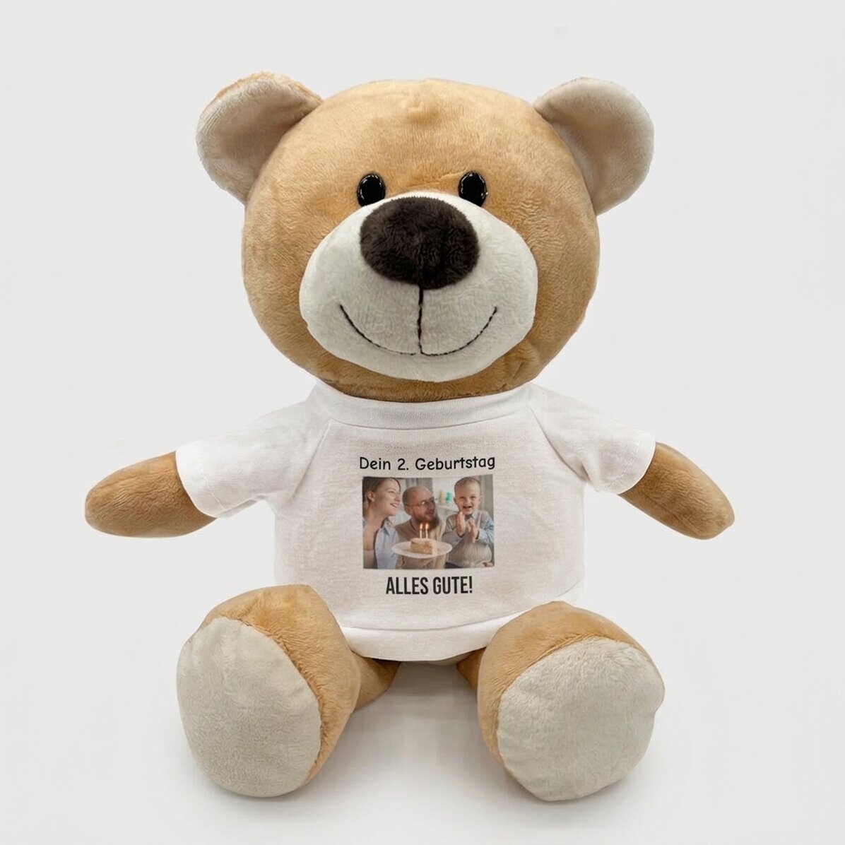 Außerdem ein personalisierter Teddybär mit einem Foto und einem Text