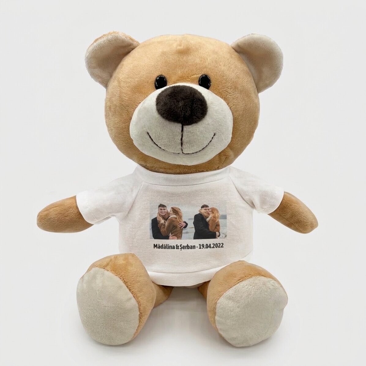 Außerdem ein personalisiertes Teddybärchen mit zwei Fotos und einem Text