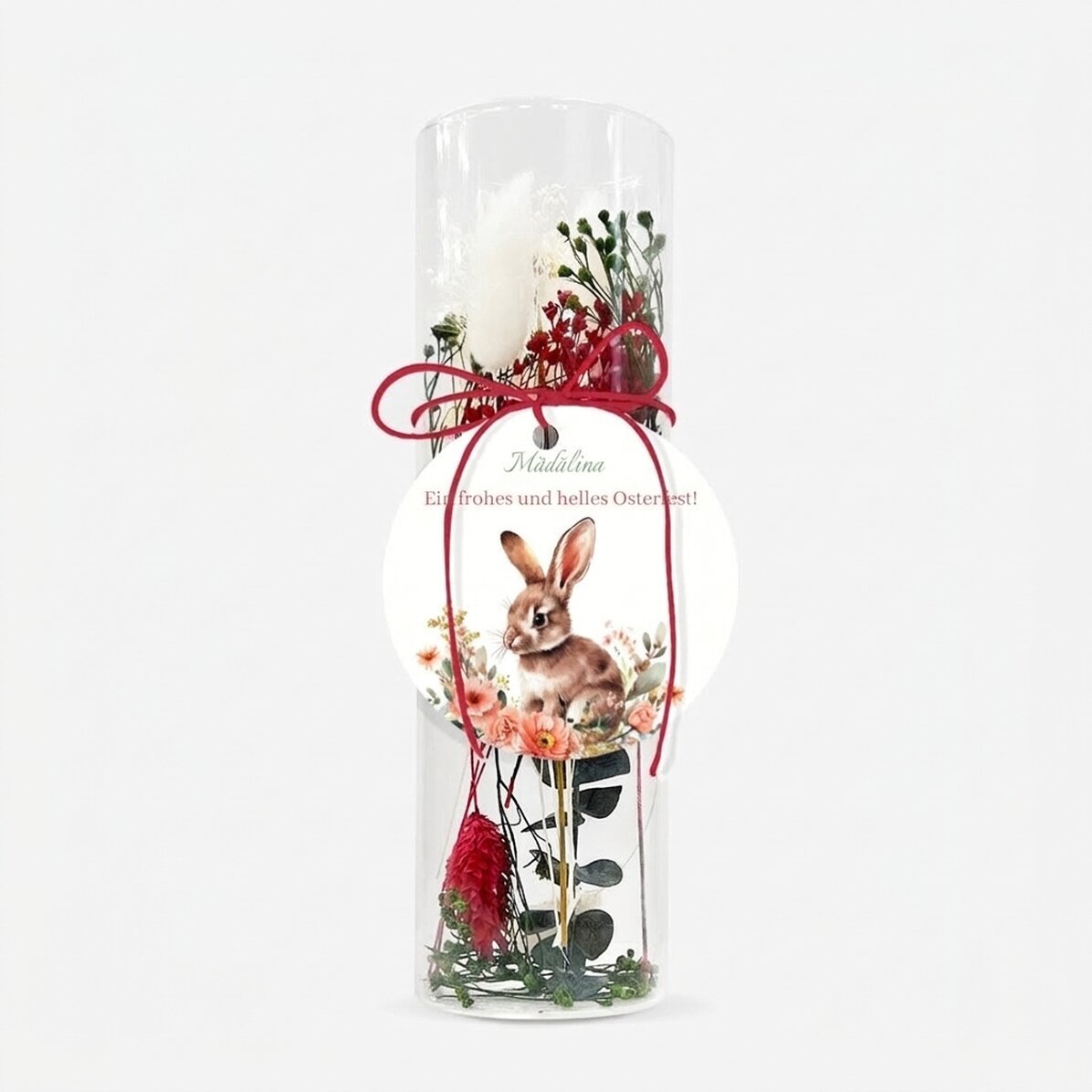 Glasornament mit konservierten Blumen, individuell gestaltet mit der Botschaft „Frohe Ostern!“