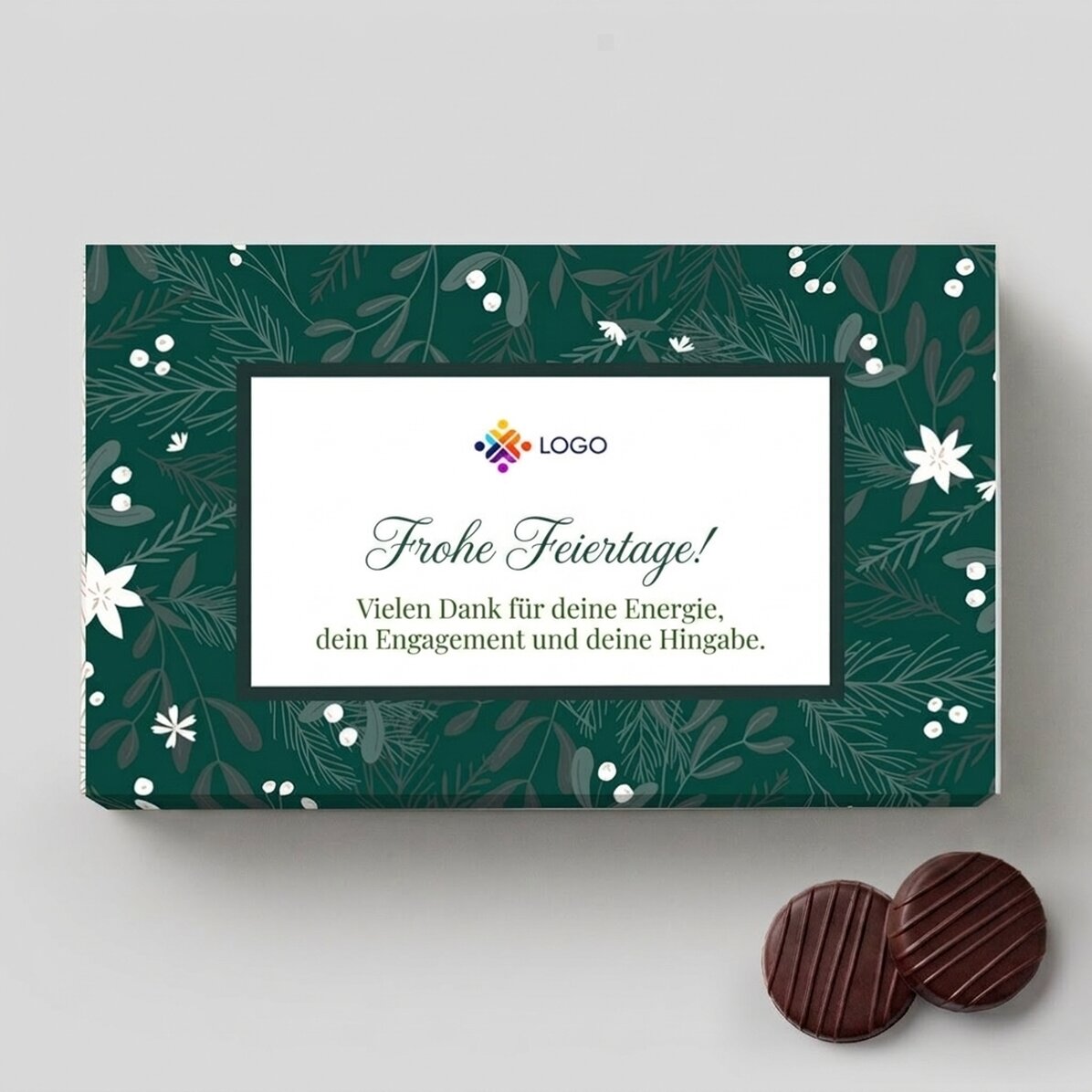 Pralinenschachtel mit Cremefüllung, individuell gestaltet mit Logo und Botschaft – Frohe Feiertage!