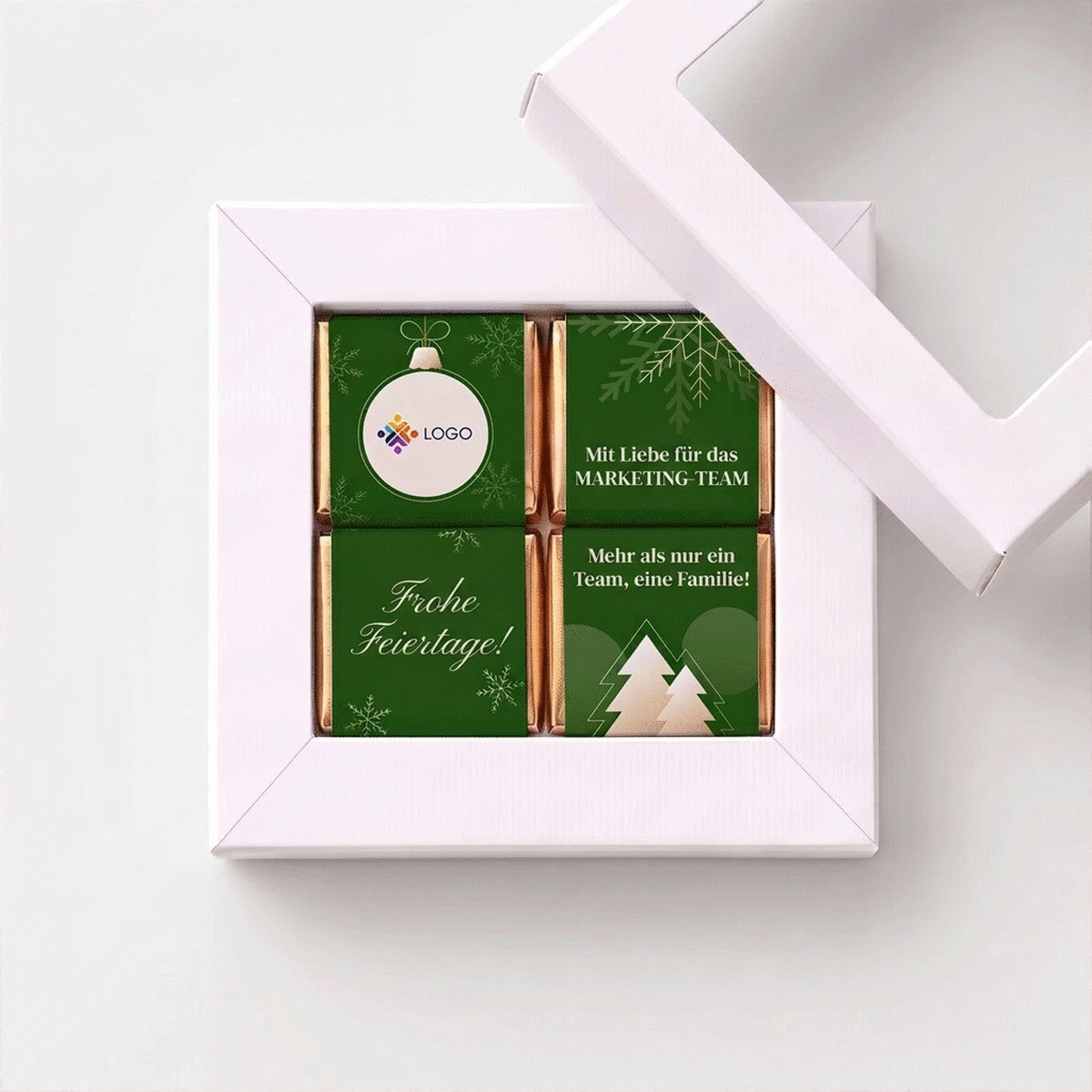 Geschenkbox mit 4 personalisierten Mini-Pralinen mit Logo und Botschaft für das Team