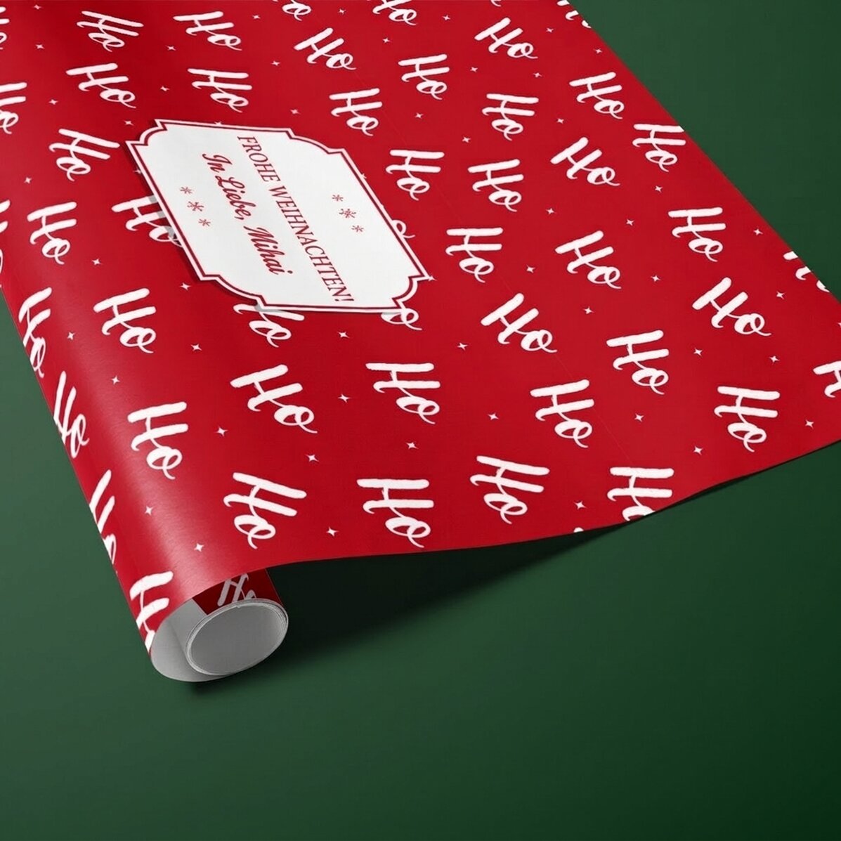 Individuell gestaltetes Geschenkpapier mit Text in einem Rahmen – HoHoHo